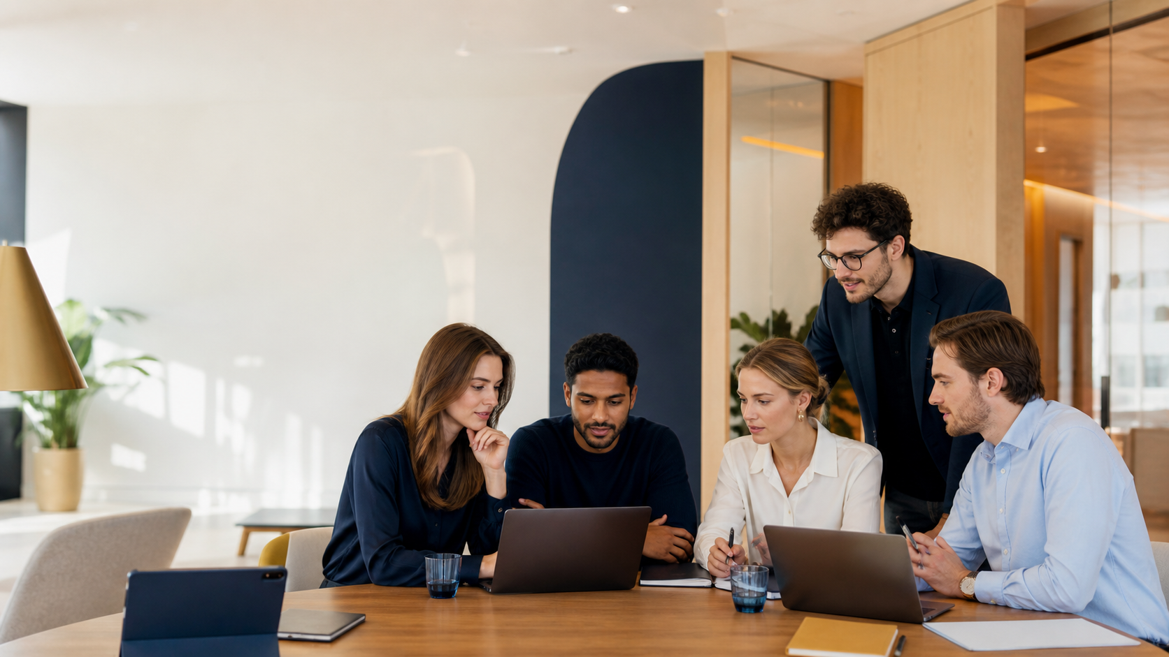 Technology professionals collaborating in a bright office